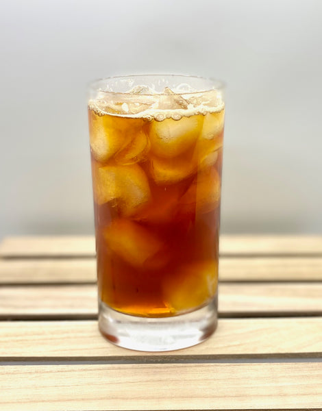 Iced pumpkin spice black tea in a glass
