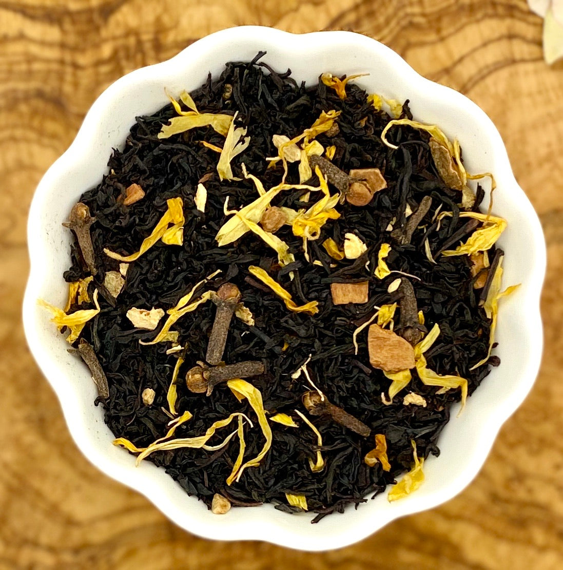 Pumpkin spice black tea loose leaves in a bowl