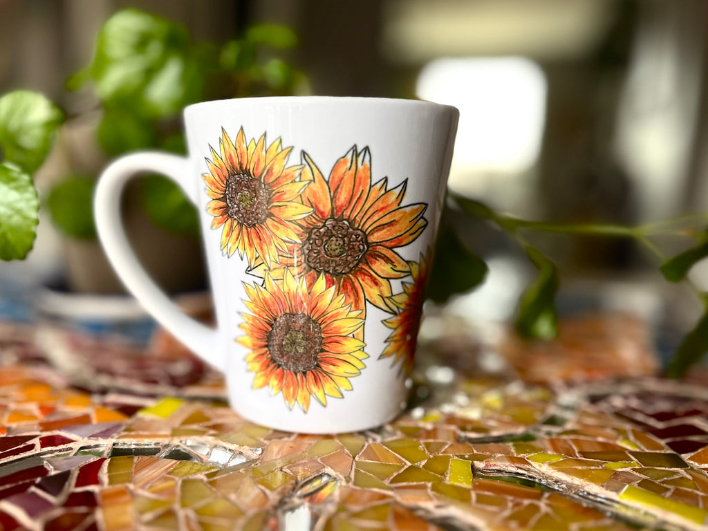 https://www.travelingteapotco.com/cdn/shop/files/SunflowerMugStyled_1024x1024.jpg?v=1682446276